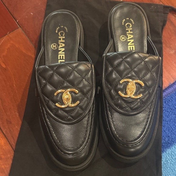 CHANEL Shoes - CHANEL Black Quilted Leather Slip-On Mules with Gold CC Hardware